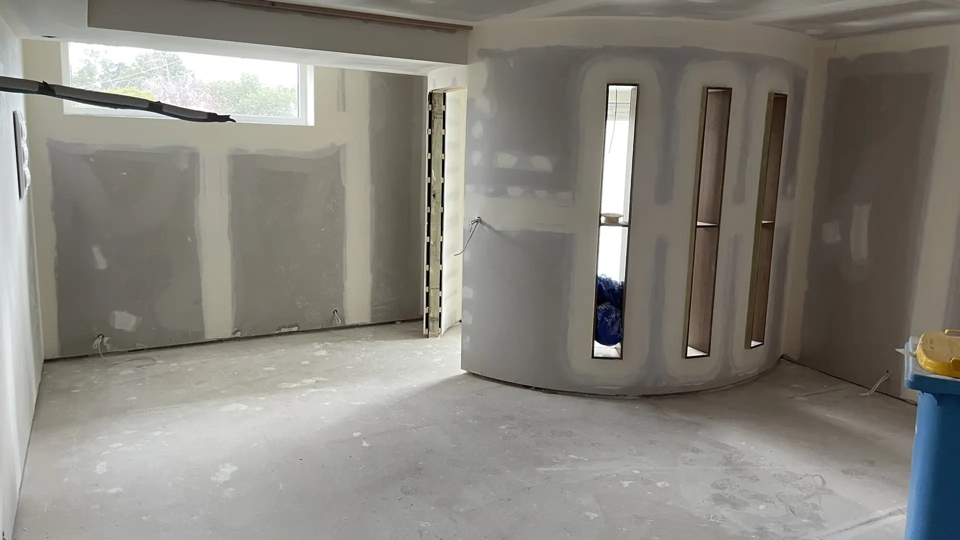 Paint-ready plastered walls in a newly renovated room in Seymour