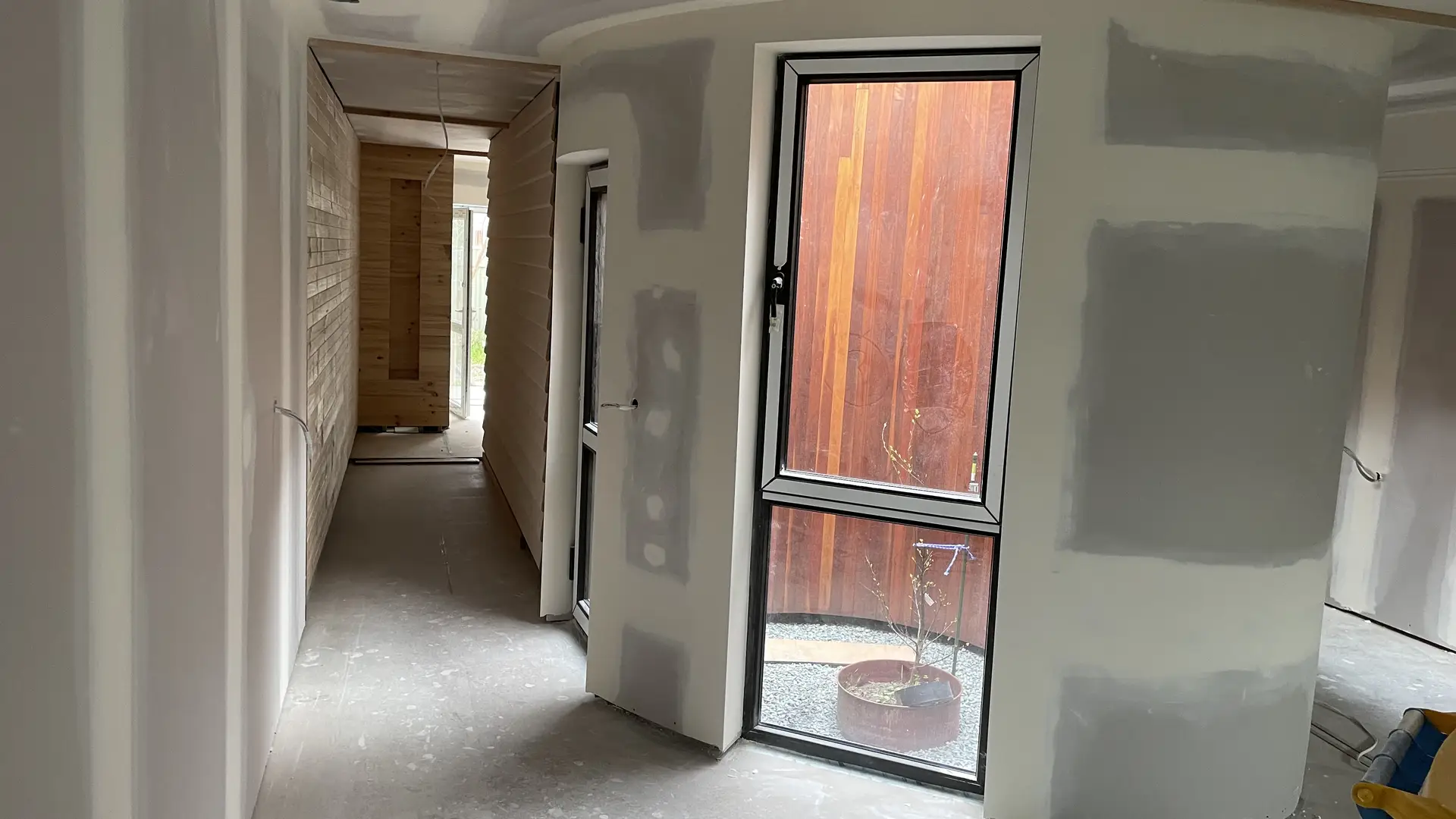 Smooth set plaster finish on walls and ceiling in Seymour residence